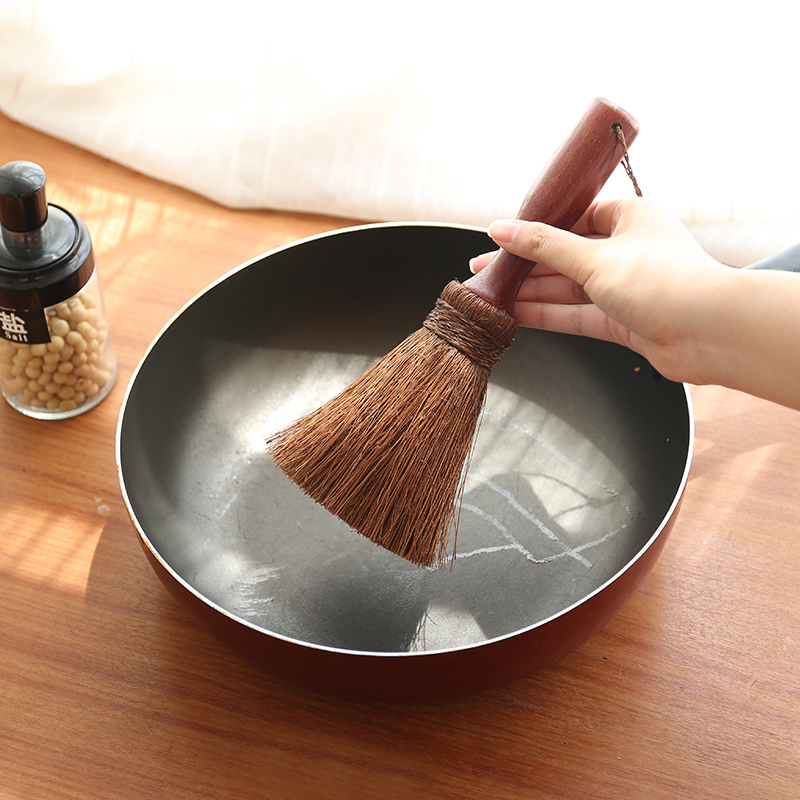 Hansmiths don't stick to the pan, the brushes are soft and natural palms don't hurt the pan not the oil can go to the oil cleaning brush pot god