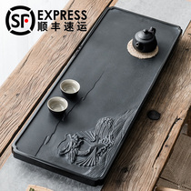 Wei Shan master carving works Natural black gold stone tea tray Household whole stone tea table Simple stone small tea sea