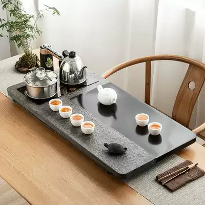 Wu Jinshi tea tray Automatic induction cooker All-in-one set Simple household natural whole stone stone large tea table