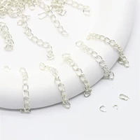 Около 26 серебряных цепочек длиной 5 см.