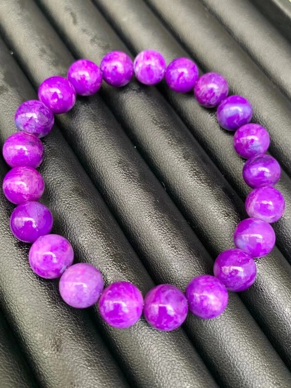 Natural Sugilite Bracelets and Necklaces with Engraved Pendants in Various Sugilite Types Natural Sugilite Bracelets and Necklaces with Engraved Pendants in Various Sugilite Types