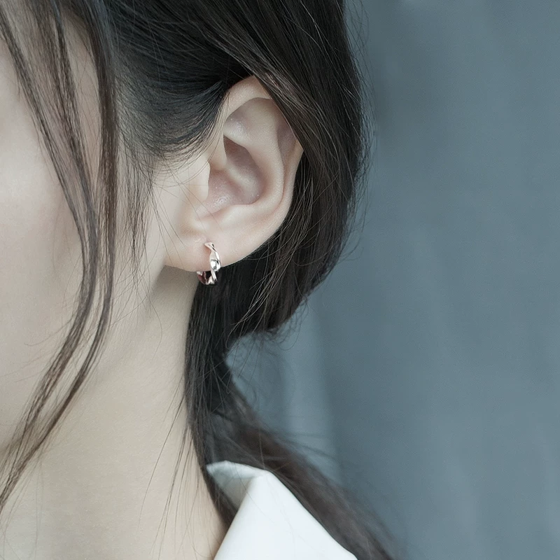 Small sophisticated design earrings, silver 925 sample