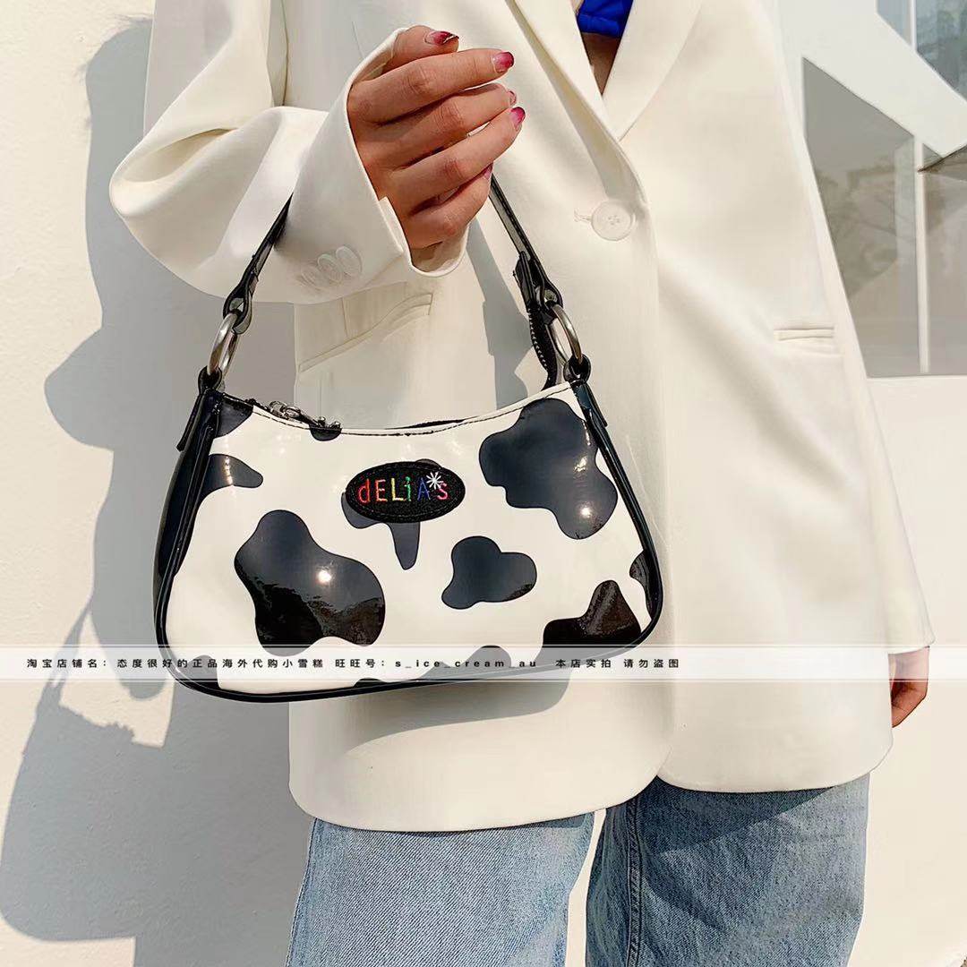 Ex-gratia spot US dollskill delia exploits with cow tattoo hot girl retro French stick bag