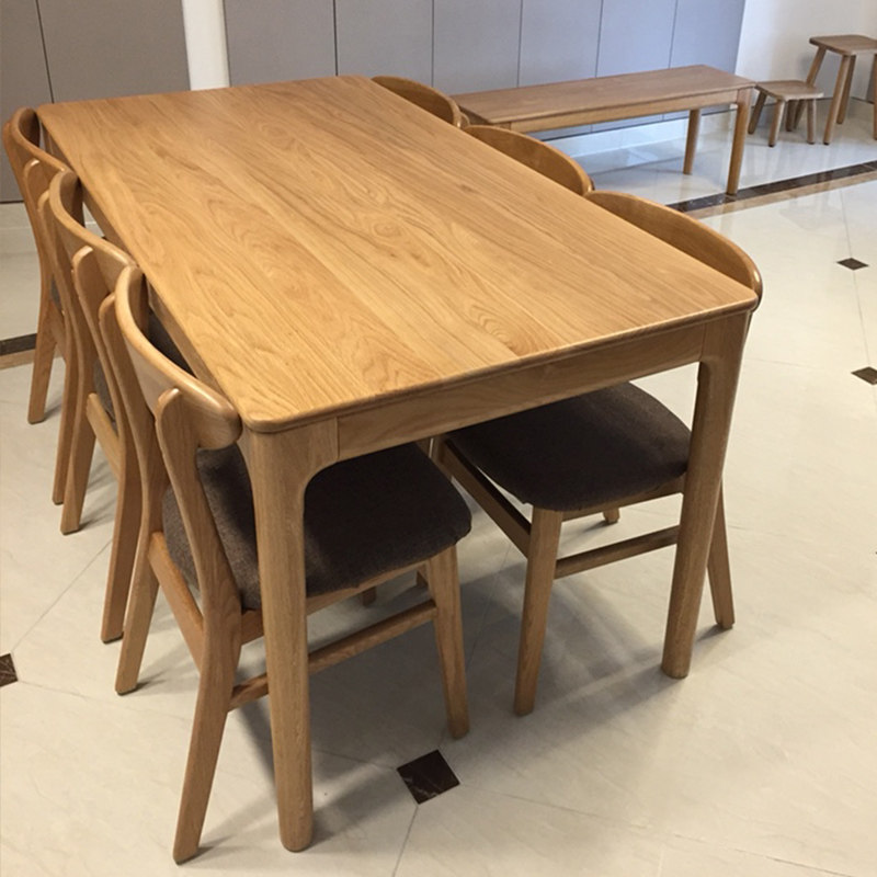 Solid wood dining table and chair combination Nordic small apartment oak 4 people 6 people Japanese simple household 1 8 meters dining table combination