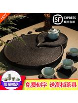 Yong porcelain natural black gold stone tea tray Household simple Kung Fu tea set tea sea round stone tea table large medium tray