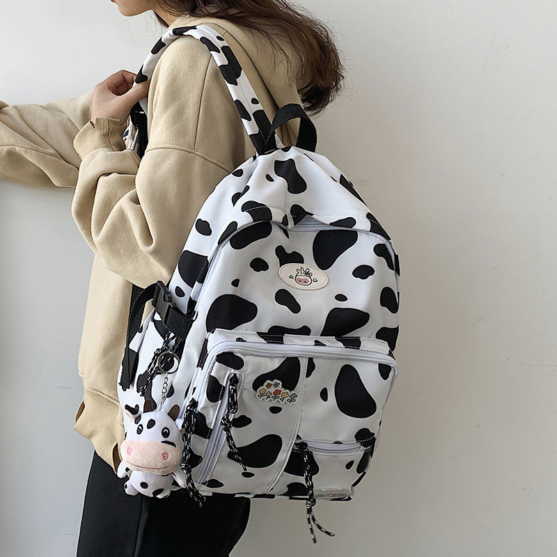 Hong Kong primary school student schoolbag female Korean version of the junior high school student grade 3456 cute cow backpack girl backpack