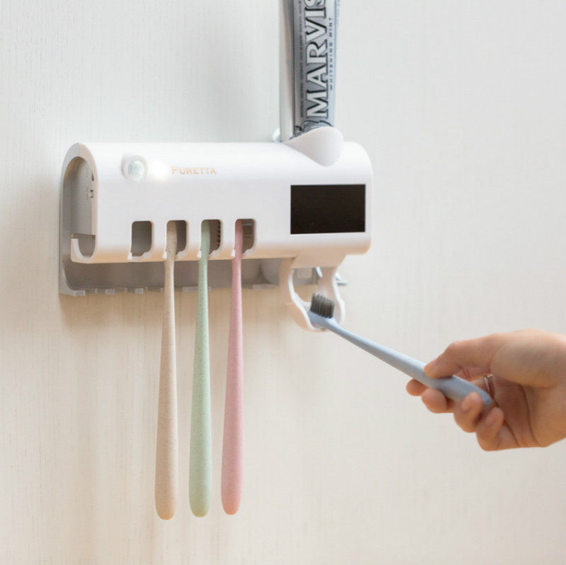 Toothbrush Toothpaste Shelve Makeup Room Free of perforated wall-mounted toothbrush stand UV germicidal sterilizer milking toothpaste