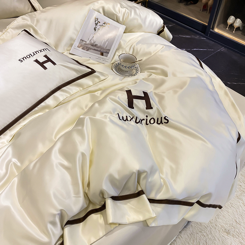 Ins wind Nordic Tencel four-piece set 1 5 meters light luxury double-sided high-grade silk quilt cover bed hat silk smooth rice white bedding