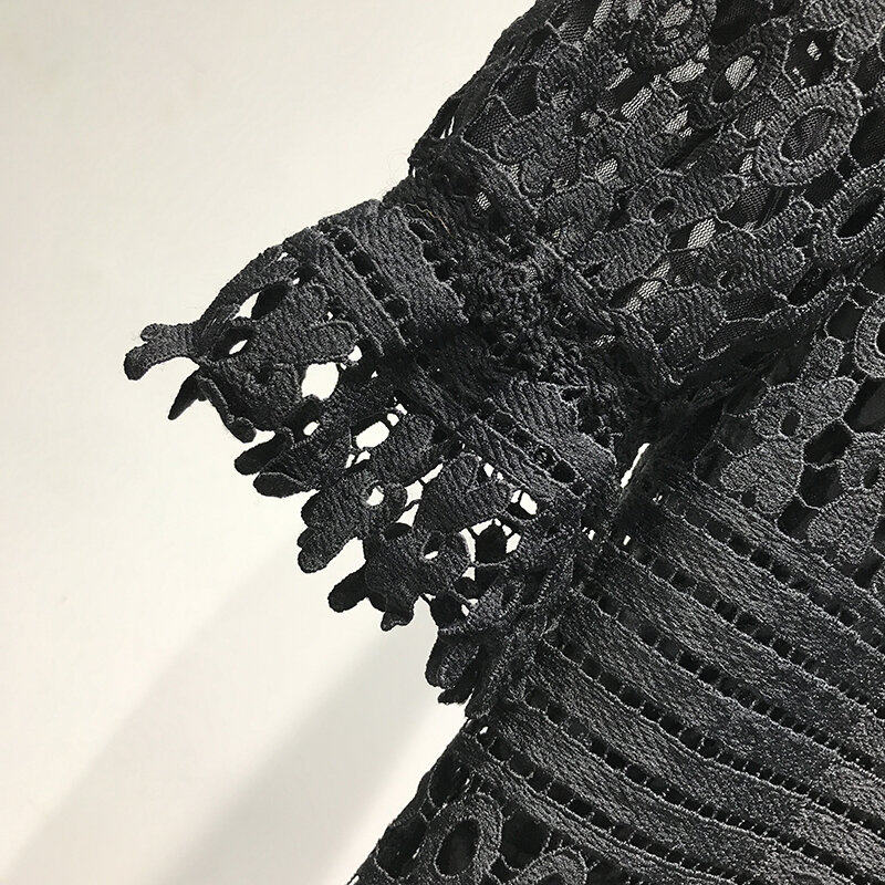 L系列 優雅鏤空洋裝上品品牌折扣女裝專櫃秋新款流蘇中長裙