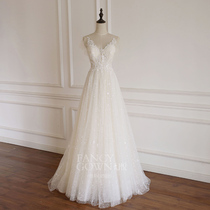 The new champagne ruffle sleeves V neck qi ground A skirt light gauze starry sky sen sen sen sen system embroidered lace wedding dress small tall and thin