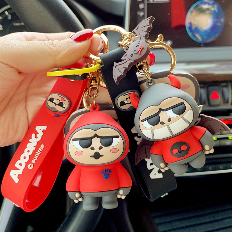 Genuine ass ape keychain female cute ins net red car key pendant Male creative bag pendant doll