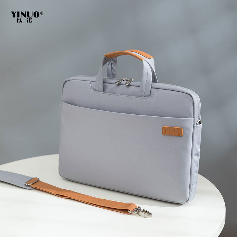 Application of the Lenovo HP 14-inch Apple 15 4 inch Apple 15-inch pen electric package with the Nominimyo computer bag female hand liner bag