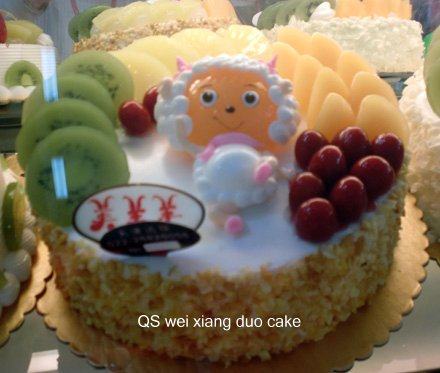 Birthday cake for children, birthday beauty and goat cartoon for children