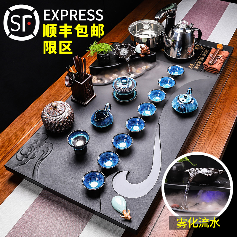 The whole black stone tea tray Kung Fu tea set set household black stone tray large atomized flowing water stone tea table