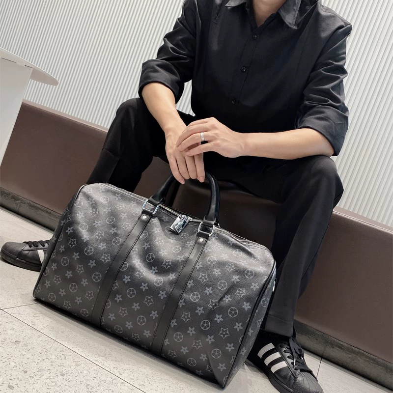Hồng Kông mua túi du lịch bằng da của nam giới có dung lượng lớn đi công tác ngắn hạn du lịch túi hành lý xách tay nữ thể dục - Túi du lịch