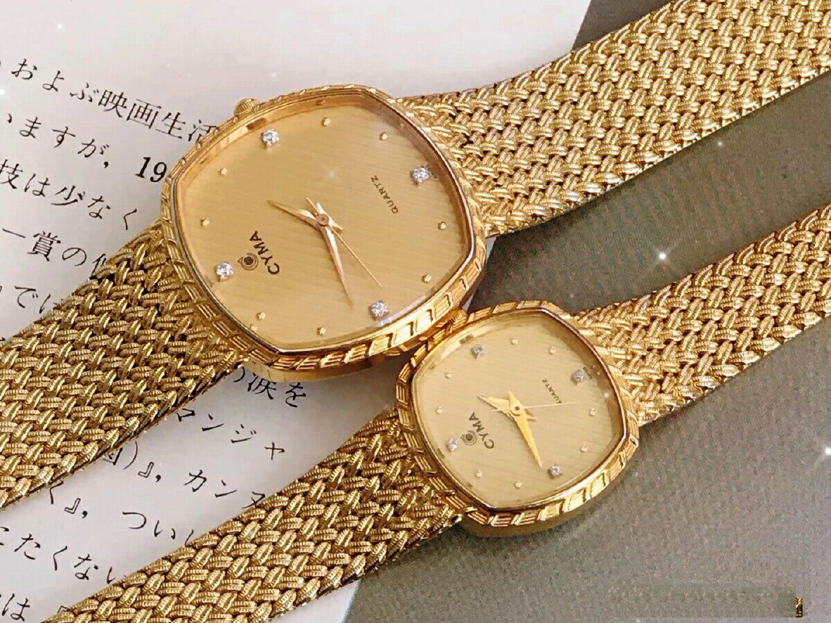 Cyma Swiss 18k gold knitting chain electronic quartz couple watch (one pair)