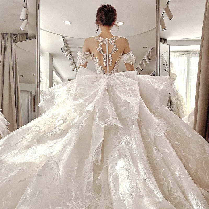 New Net red luxury lace main wedding bow long sleeve Palace autumn and winter retro European backless dream tailing