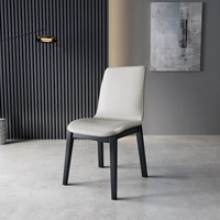 Черно-белое кожаное цельное кресло