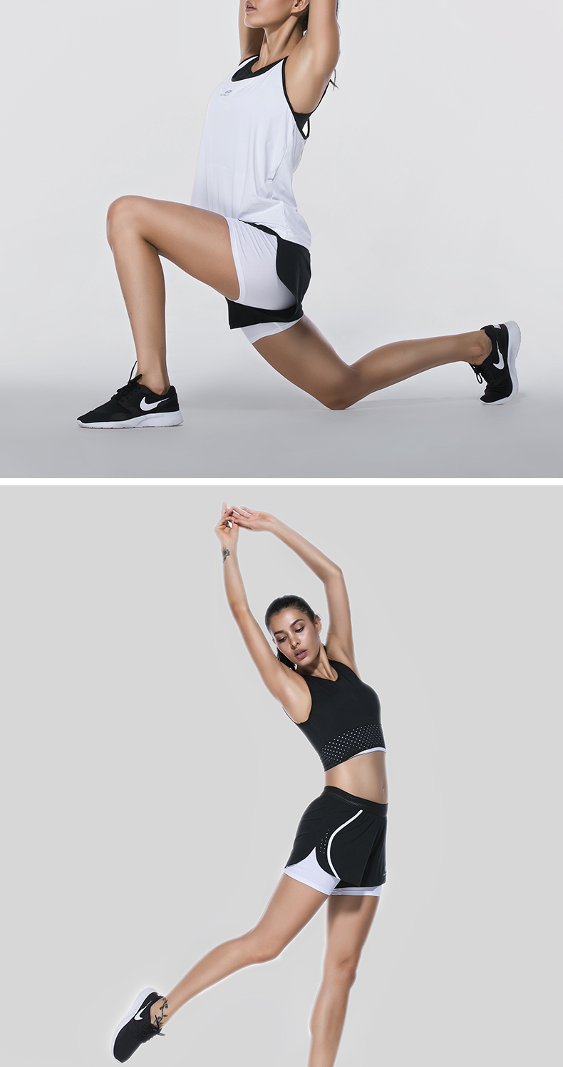 Quần short thể thao yoga nữ thường xuyên thoáng khí tập thể dục nhanh khô kéo dài quần chạy chống ánh sáng giả hai quần đào tạo - Quần thể thao quan tap gym