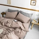 Kiểu Nhật denim in bông màu xám bông rửa ròng bông màu đỏ rắn đơn giản giường lanh khí quyển Bắc Âu - Bộ đồ giường bốn mảnh