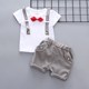 . Childrens mùa xuân 2020 Hàn Quốc phiên bản bộ cậu bé ngắn tay áo top quần short childrens trẻ em quần áo hai mảnh.