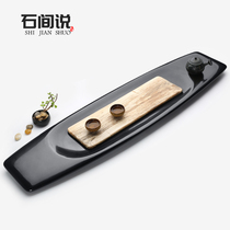 Shi Jian said natural whole piece of wood fossil tea tray household Wujin stone tea table modern simple stone tea tray