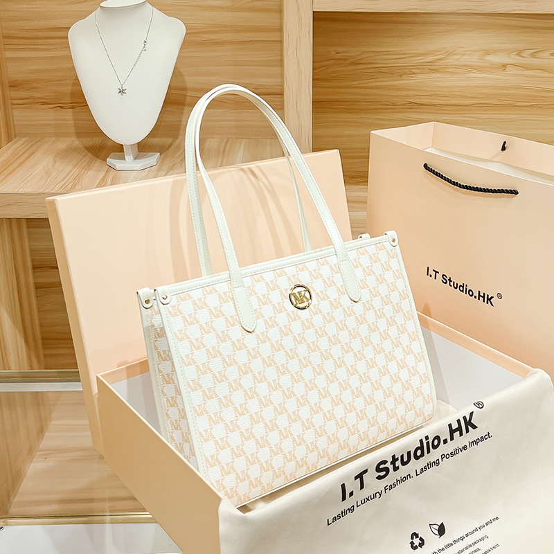 Hong Kong tote bag women's 2022 new autumn and winter niche leather high-quality large-capacity commuter shoulder bag large bag