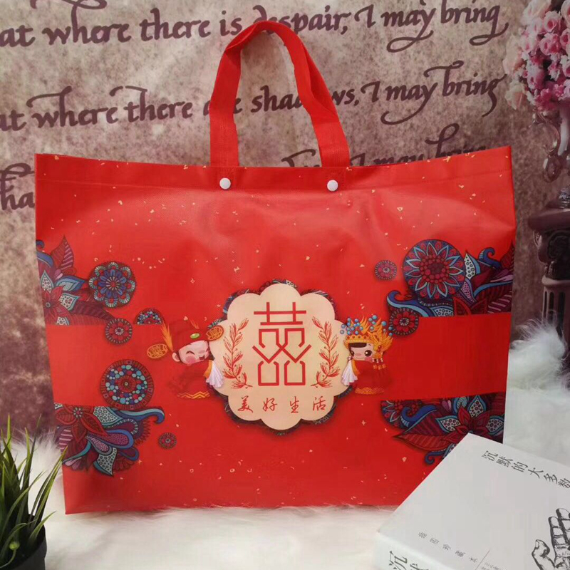 Xia quilt packaging bag non-woven storage bag festive quilt packaging four-piece handbag can be customized 2021