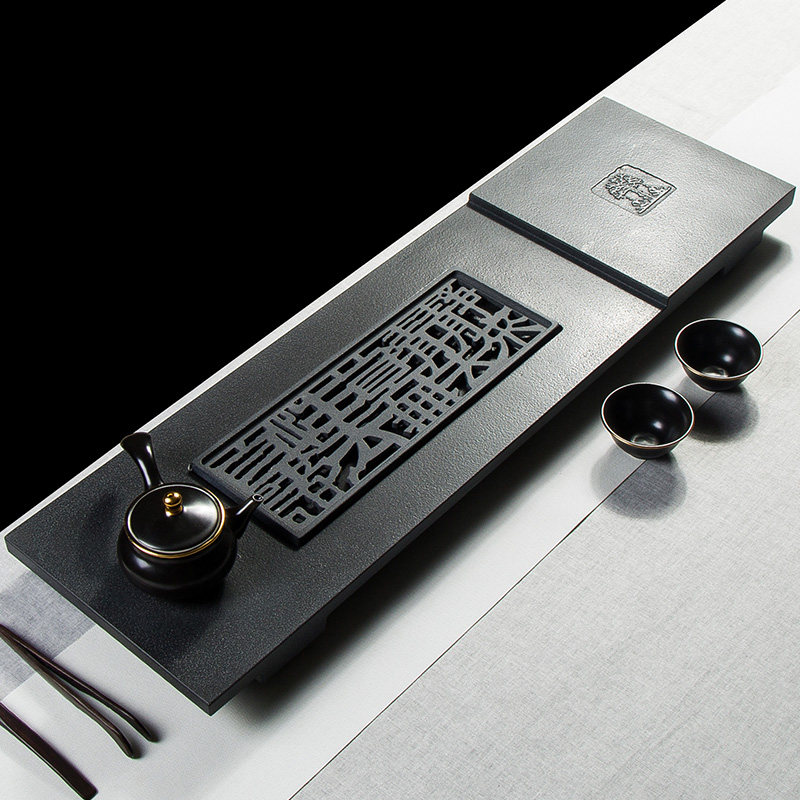 The whole black gold stone tea tray natural stone tea sea tea table household black gold stone creative tea set drainage