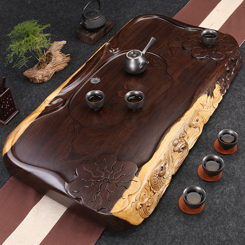 The whole ebony tea tray natural solid wood tea table Kung Fu fine carving simple household large thickened log tea set