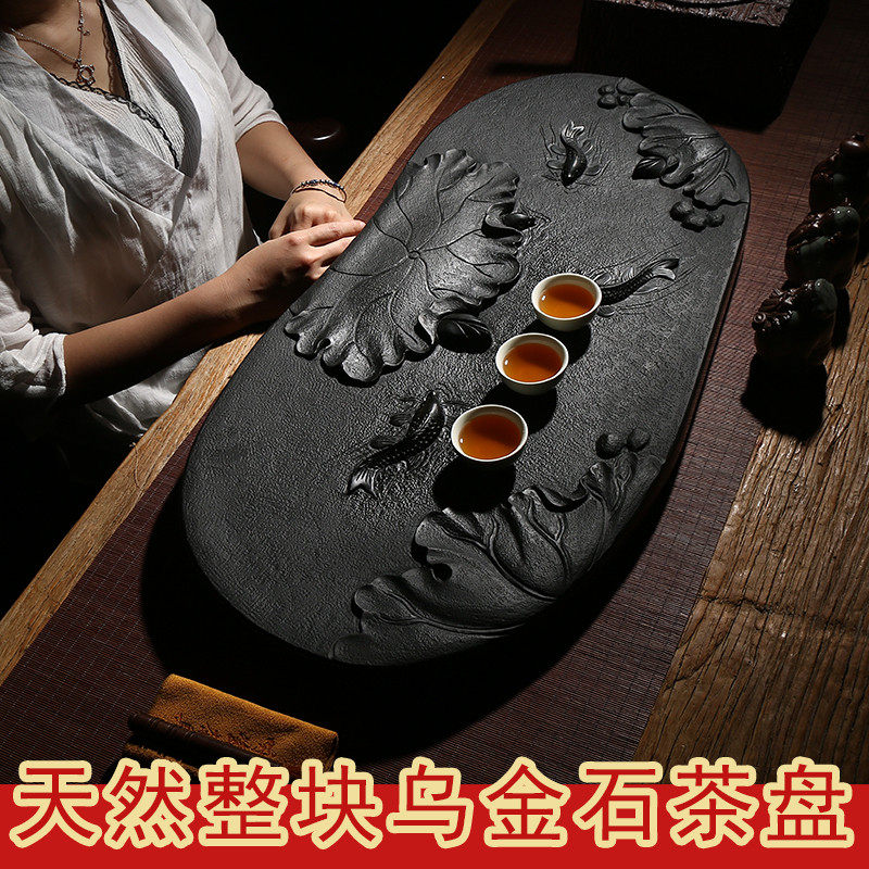 Natural whole block relief Urginstone tea tray big number stone tea table black gold stone tea sea allegory years more than