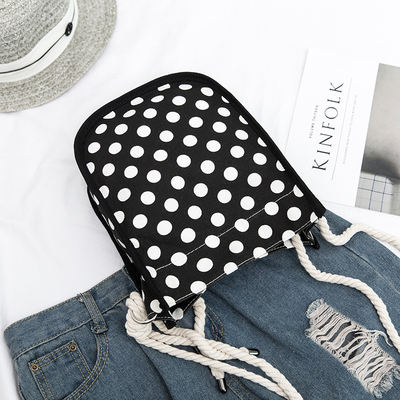 This is a new Korean-style canvas bag with a polka dot vacation style, practical and versatile, artistic single-shoulder crossbody bag