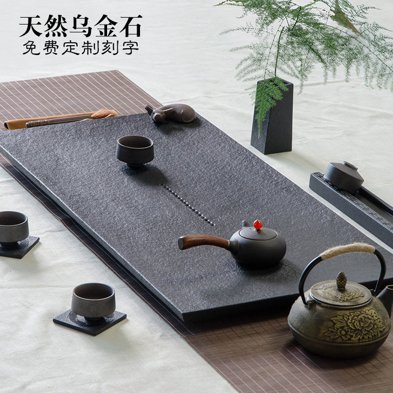 高档天然乌金石头茶盘：家与办公室里的新中式泡茶艺术-茶盘-淘宝百科网