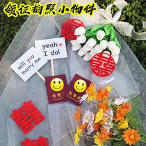 Newlyweds getting married receiving certificates taking photos ins style props personalized creative handheld outdoor bridesmaid posing artifact