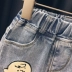 Quần denim trẻ em Snoopy / SNOOPY trẻ em 2020 quần áo mùa hè mới cho bé trai và bé gái xu hướng quần năm điểm phong cách nước ngoài - Quần jean