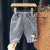 Quần denim trẻ em Snoopy / SNOOPY cho bé trai và bé gái 2020 quần năm điểm trẻ em mùa hè mới - Quần jean Quần jean