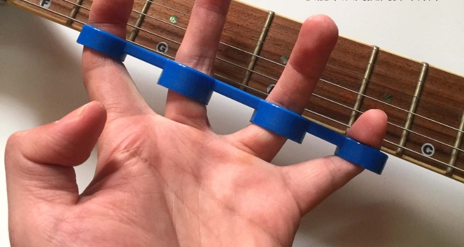 Guitar ngón tay ukulele mở rộng chỉ mục ngón tay ngón tay đàn piano dây đàn guitar acoustic elixir