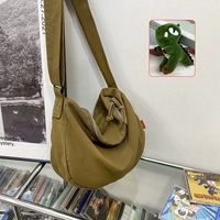 Коричневый динозавр, подвеска