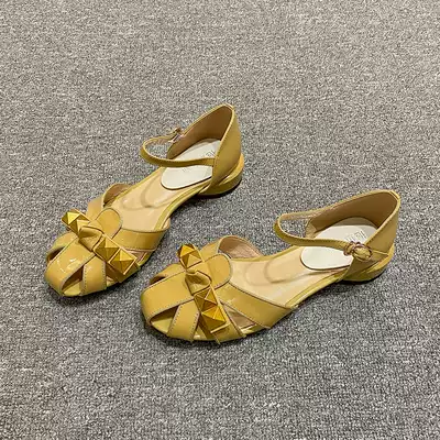 Overseas 2021 female summer new leather flat sandals Baotou hollow rivet buckle low heel thick heel