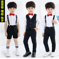Children flower boy gown boy piano performance in costume CUHK boy back with pants suit student presenter performs costumes