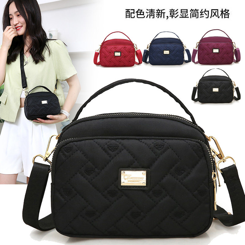 网红休闲小包尼龙布斜挎包新款简约时尚爱心包百搭单肩包防泼水