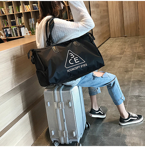 Túi màu đỏ du lịch khoảng cách ngắn nữ xách tay công suất lớn quần áo túi hành lý túi Hàn Quốc thể thao túi thể thao thủy triều túi du lịch thể thao