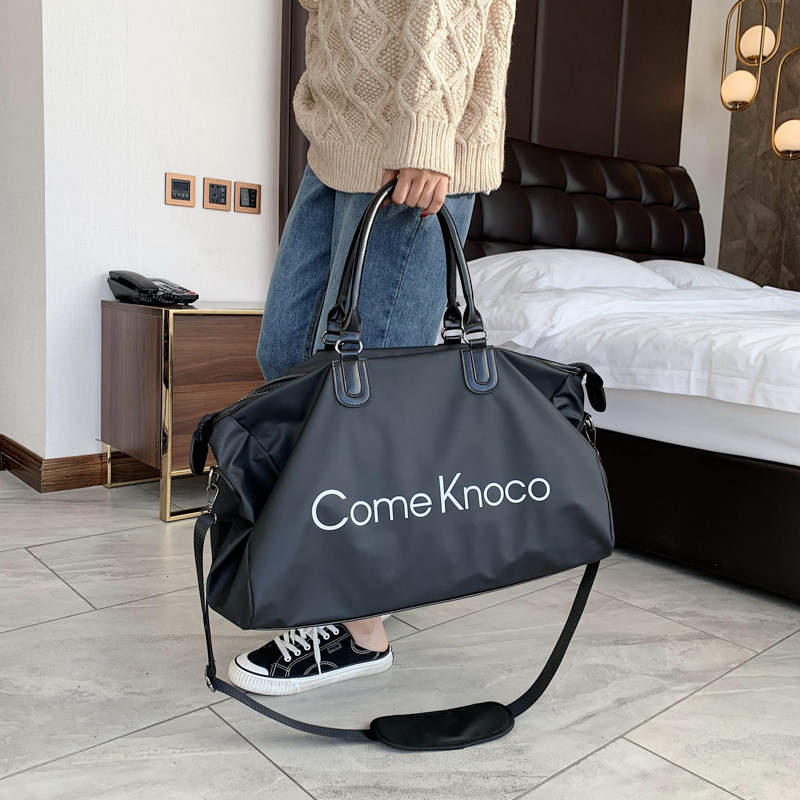 Travel bag Large capacity women's light travel handbag Clothes Yoga fitness bag storage bag Waiting bag Luggage bag