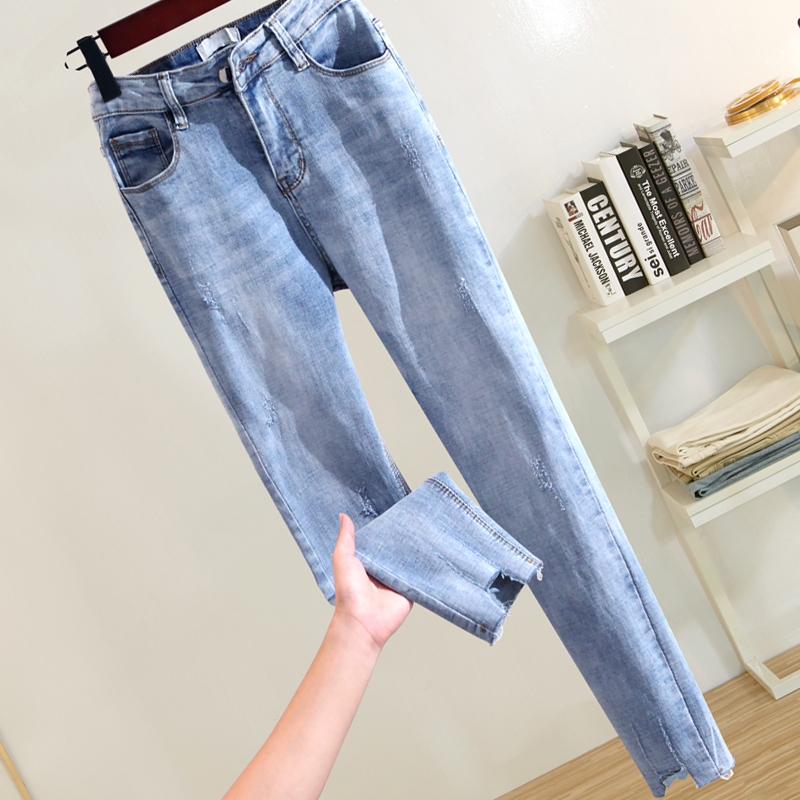 2022 autumn new Hong Kong style thin ripped light blue jeans women's stretch tight nine-point pencil pants - Taobao