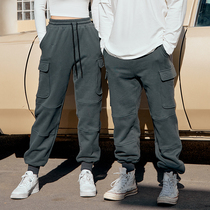 Alpha male and female with the same type of gapped work pants drawing rope big pockets European and American wind trendy fashion lovers sport long pants