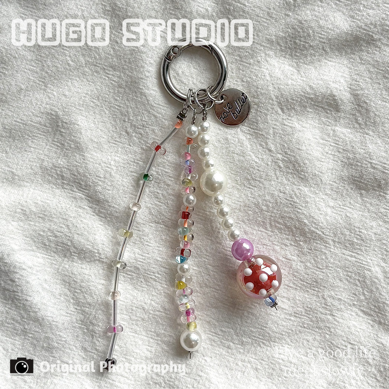 HUGO's popular Xiaohongshu (Little Red Book) style colorful peanut and pearl beaded phone chain, keychain, bag, and phone lanyard for girls.