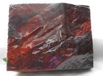 Guilin chicken blood jade exquisite natural jade mouth material black background and red brand wool material (IT5)