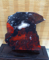 Guilin chicken blood Jade exquisite natural jade mouth material black background red wool raw stone 760 grams