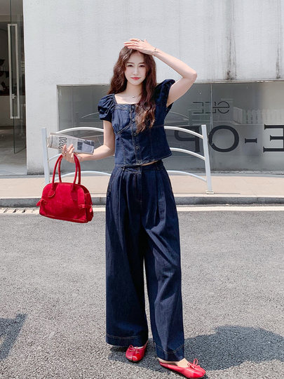 深蓝色港风复古牛仔套装女2025夏季设计感泡泡袖上衣阔腿裤两件套