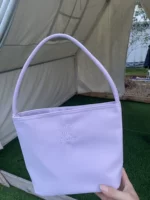 Большая регулировочная пластина фиолетового цвета.